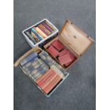 Two boxes and a vintage leather suitcase of books including children's encyclopaedia, Dickens,