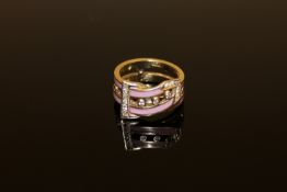 A diamond and enamel buckle ring