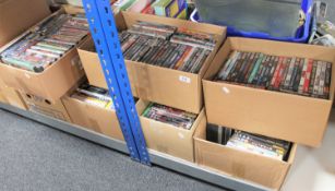 Seven boxes containing a large quantity of DVD's