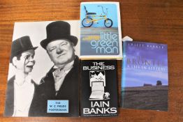 Three signed books; The Business by Iain Banks, The Brontes, A Life in Letters,