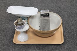 A tray of vintage scales with weights, pottery mixing bowl,