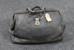 An early twentieth century leather Gladstone bag