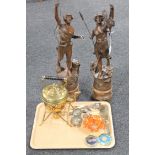 A large pair of French patinated metal figures of hunters (a/f),