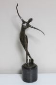 An Art Deco style bronze figure of a female dancer, on marble base,