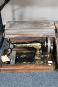 A mahogany cased vintage hand sewing machine