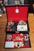 A box of vintage costume jewellery