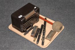 A tray of Bakelite cased master radio, drum beater, two harmonicas,