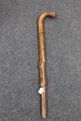 A heavy oak walking stick