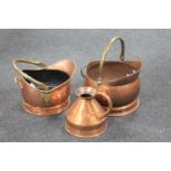 Two copper coal buckets and a copper jug