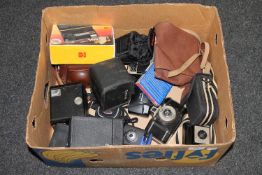 A box of approximately seventeen assorted cameras including Olympus,