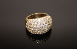 An 18ct gold large bombe diamond ring, set with 80 good quality diamonds, approximately 4ct.