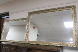 Two gilt framed bevelled mirrors