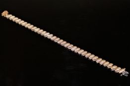 A 9ct gold diamond encrusted bracelet, 15.4g. CONDITION REPORT: Length 20cm.