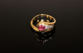 An 18ct gold ruby and diamond snake ring, 4.