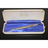 A cased propelling pencil stamped Life Long,