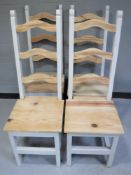 Four pine ladder back dining chairs