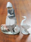 A Lladro figure of a lady with geese and another Lladro goose figure (2)