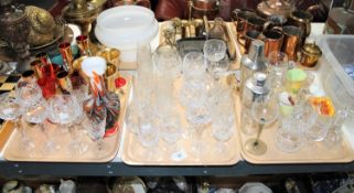 Three trays of various 20th century glass ware, cocktail shakers,