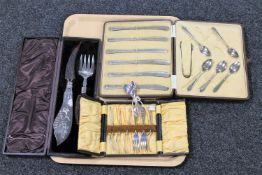 Three boxes of cutlery and five silver teaspoons