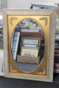 An antique style gilt framed mirror