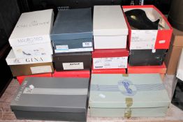 Fourteen boxes containing lady's designer shoes
