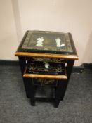 A Japanese two piece nest of tables with mother of pearl figures
