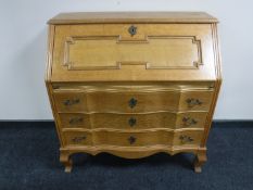 A continental light oak bureau