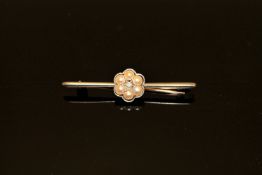 A diamond and pearl bar brooch