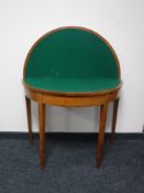 A 19th century inlaid walnut TOT d-shaped card table