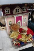 A large doll's house together with soft toys,