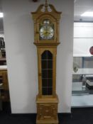 A continental light oak regulator clock