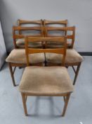 Five mid 20th century teak dining chairs