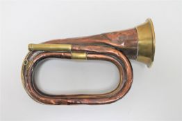 A pre First World War British Army copper and brass bugle, dated 1911.