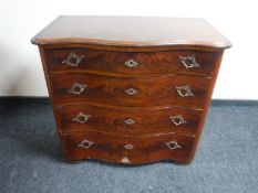 A 19th century serpentine fronted mahogany chest