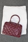 A Lulu Guinness quilted burgundy handbag, with original protective sack.