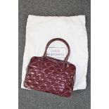 A Lulu Guinness quilted burgundy handbag, with original protective sack.