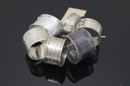 Six assorted silver napkin rings (6)
