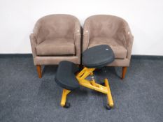 A pair of brown suede office chairs together with an ergonomic typist's chair