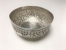 An Indian silver embossed pedestal bowl