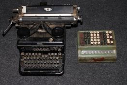 A vintage Royal typewriter and a vintage calculator