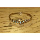 A 9ct gold Edwardian bracelet set with opals and seed pearls, 6.5g.