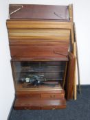 A set of mid 20th century teak bookshelves with floating system and racking