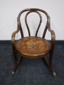 An early 20th century miniature Bentwood rocking chair