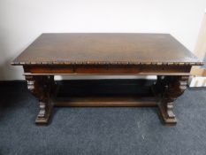 An early 20th century oak library table