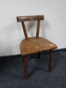 A primitive style oak child's chair