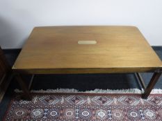 A military style mahogany low table with reinforced brass corners