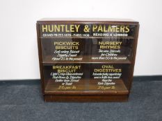 A mid 20th century and later glazed bookcase "Huntley & Palmers"