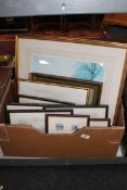 A box of pictures and prints,