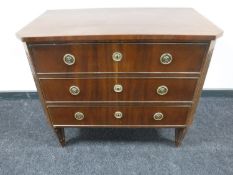 An early 20th century mahogany three drawer chest