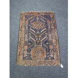 An old Baluchi rug 124 cm x 86 cm